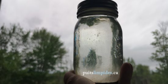 Réhabilitation d'un puits artésien grandement perturbé par de l'argile brune causant une eau trouble